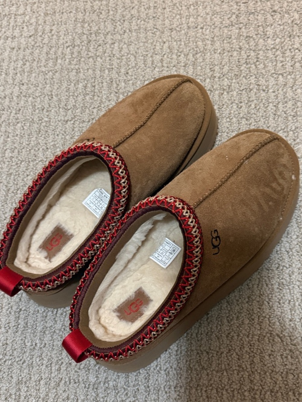 UGG Chestnut Suede Shearling Slip-Ons with Red Trim